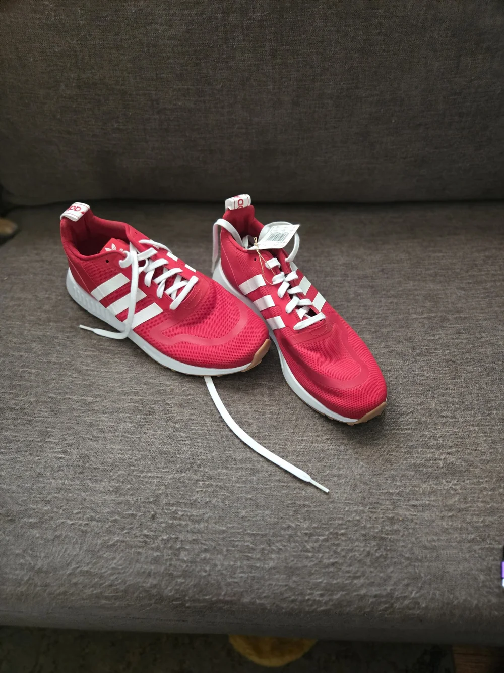 Adidas Red Athletic Sneakers with White Stripes